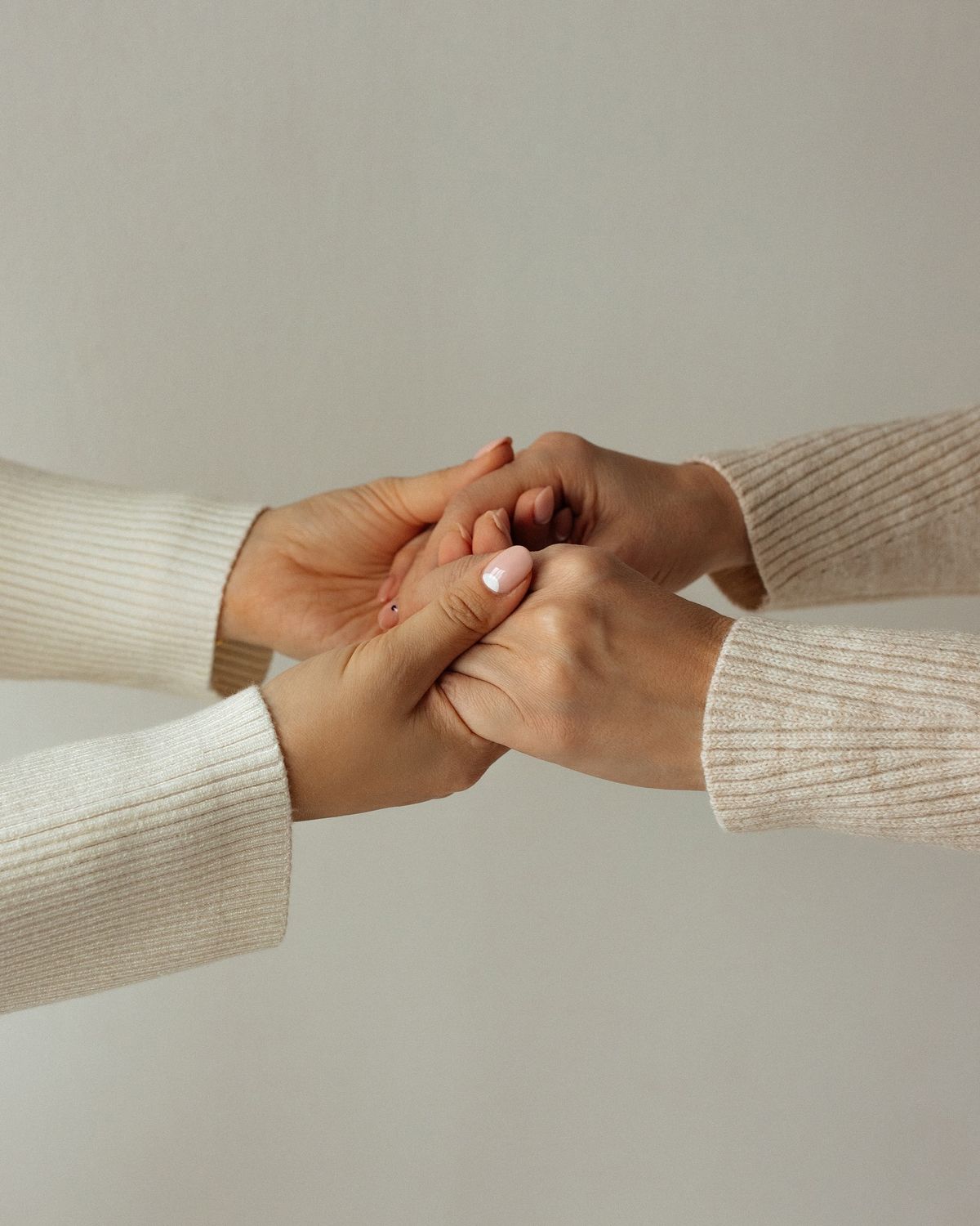 Warm, compassionate hands symbolizing therapeutic support